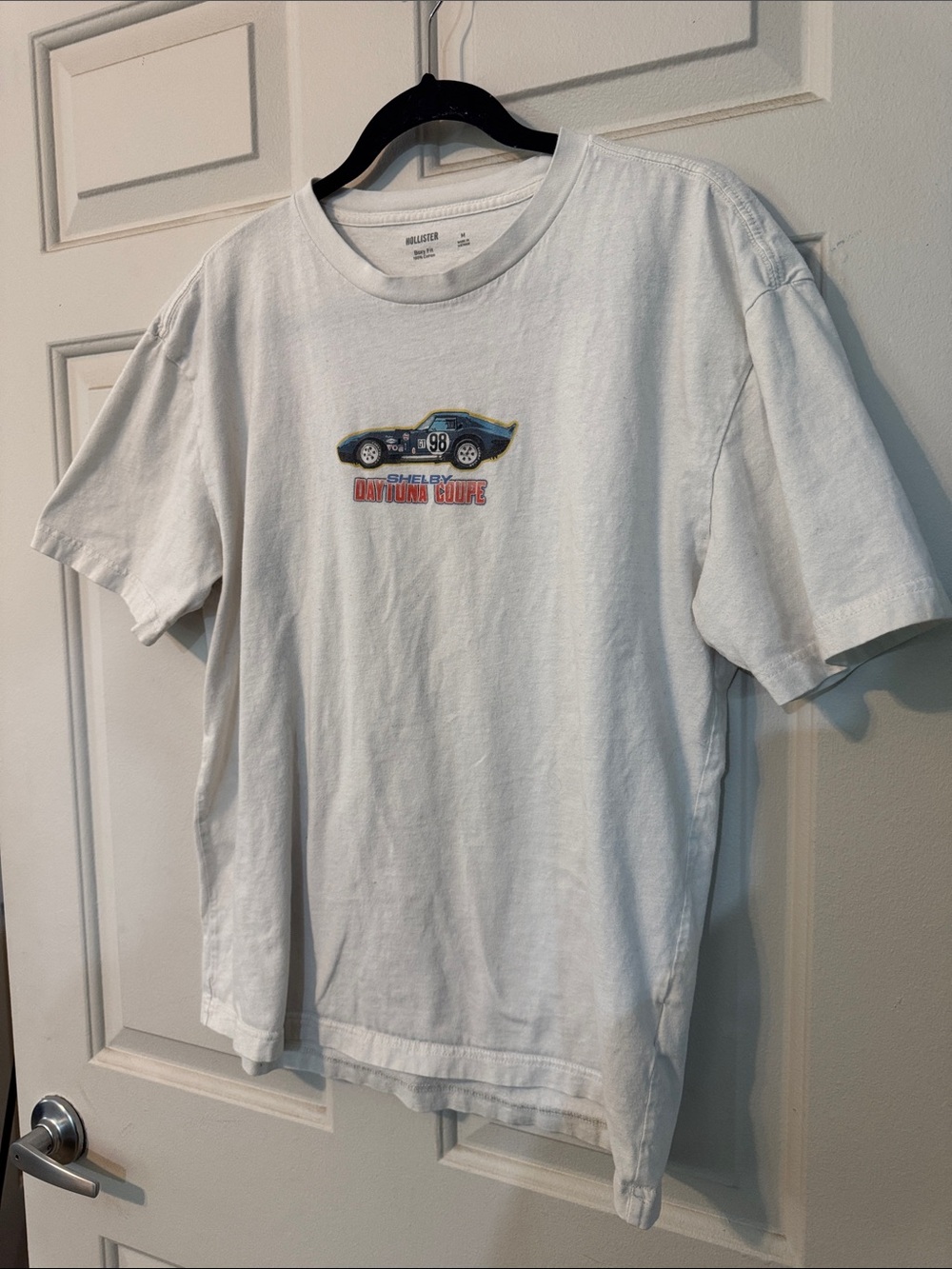 Hollister White Short Sleeve Tee with Blue & Yellow Car Graphic